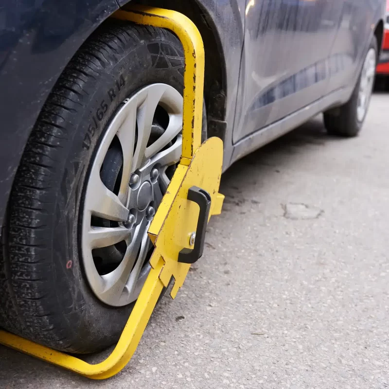 tire-lock-on-a-car-for-illegal-parking-violation-2025-03-15-01-01-58-utc