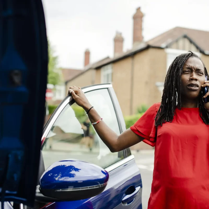 woman-calling-for-help-as-her-car-broke-down-2025-02-10-11-41-15-utc